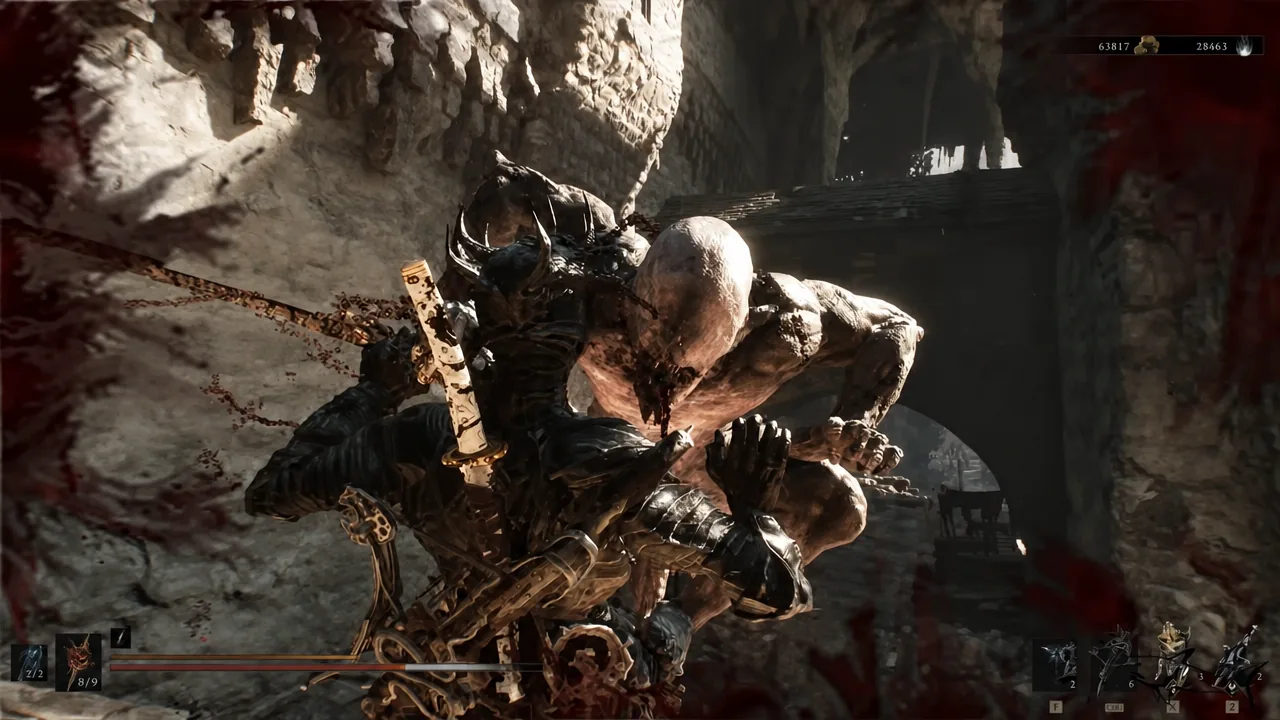 Player grappling an armored enemy during a fight inside the mine passages
