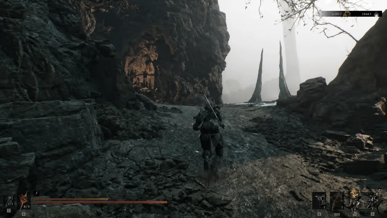 Player character sprinting down a rocky cliffside path in Mammon with the HUD visible