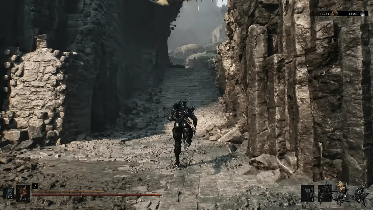 Armored player character running up a narrow rocky passage in the Ruins of Mammon