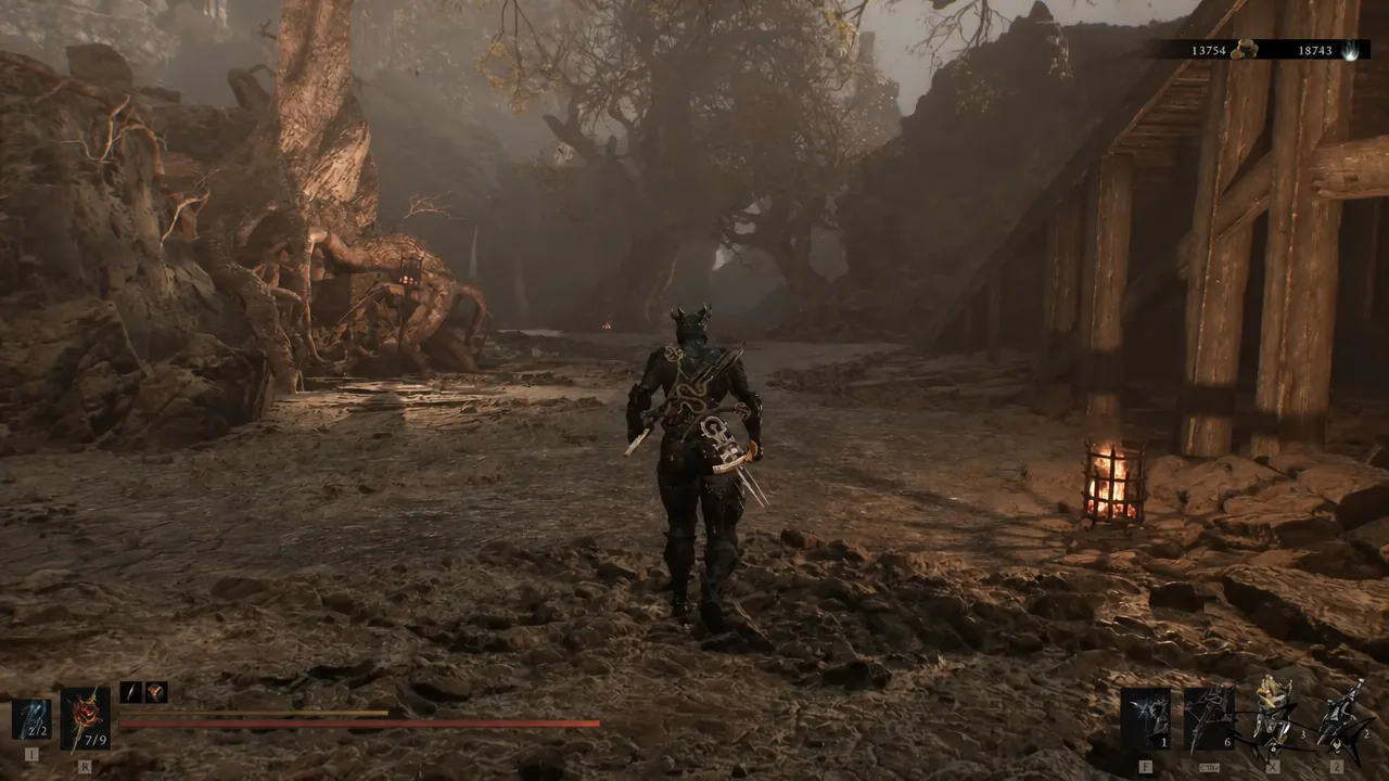 Player character moving along a torch-lit rocky path with the combat HUD on screen