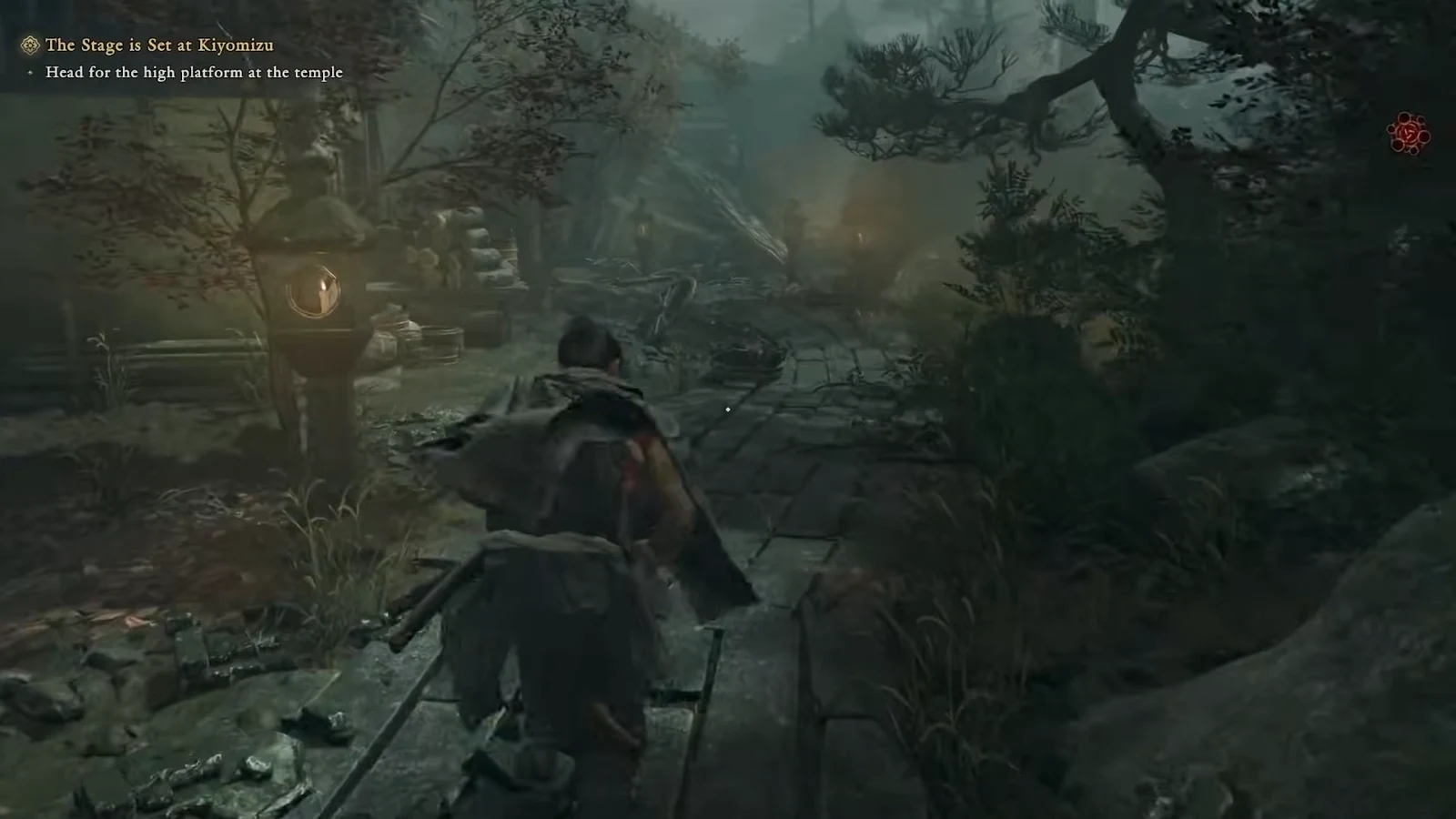 Musashi on a forest path with the objective directing him to the temple's high platform