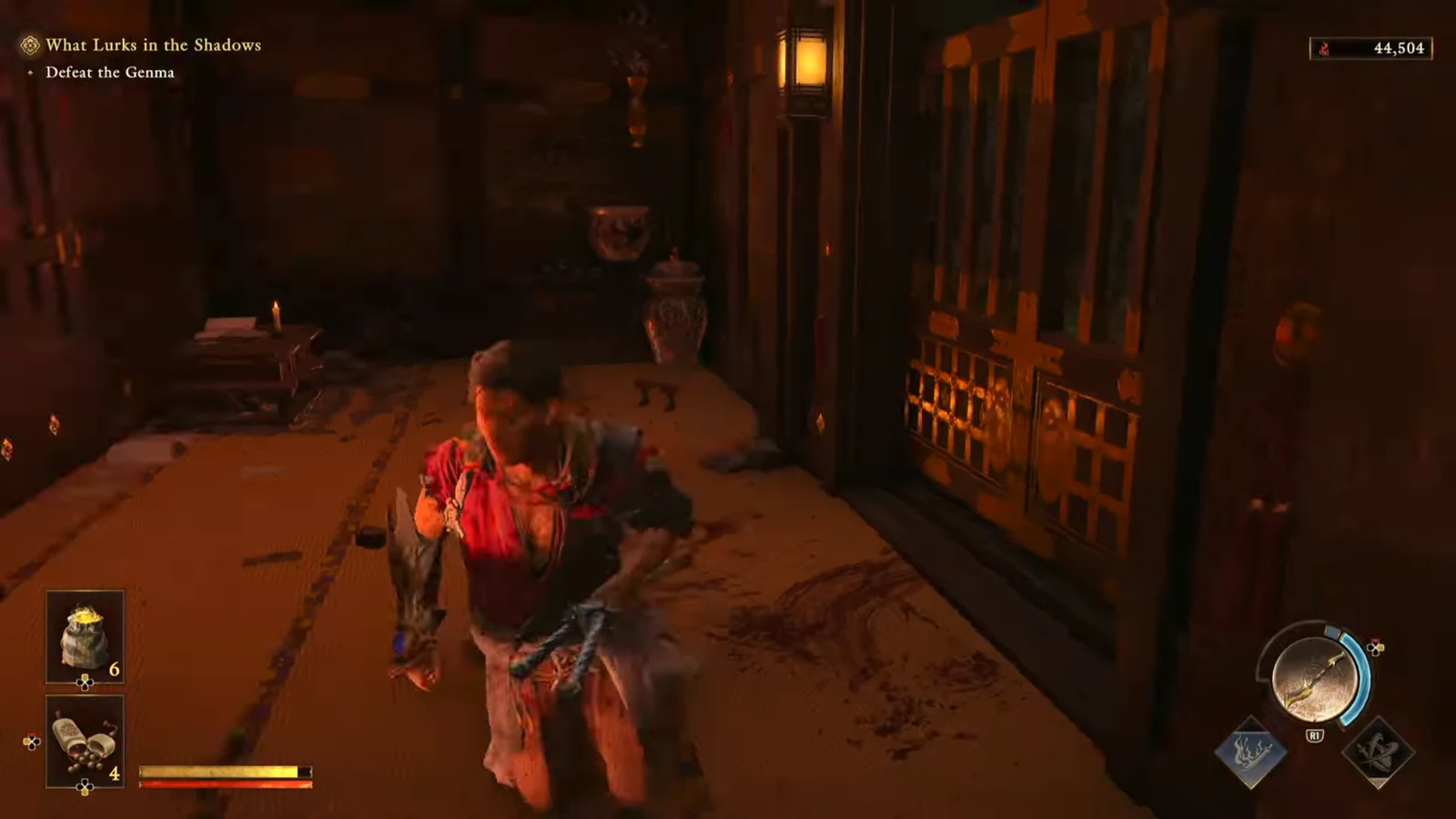 Musashi trading blows with a Genma in a dark corridor with the quest objective on screen