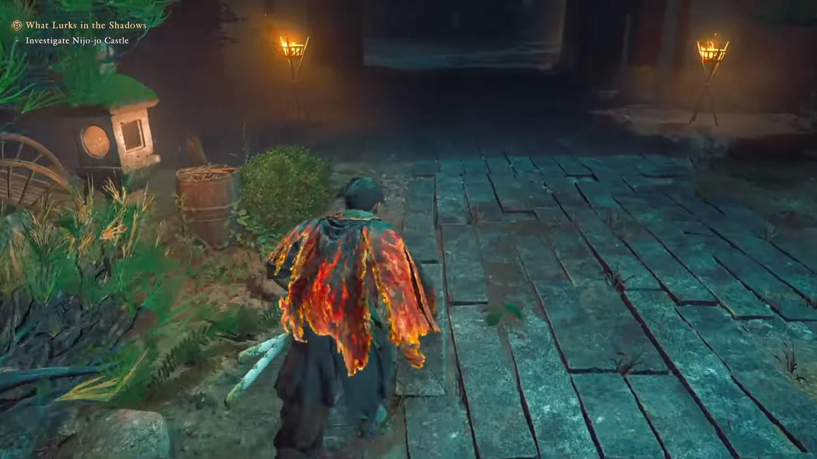 Musashi crossing a torchlit courtyard while the What Lurks in the Shadows quest is active