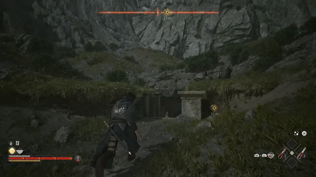 Compass objective marker at 33 meters as the player walks toward the ruin cave entrance