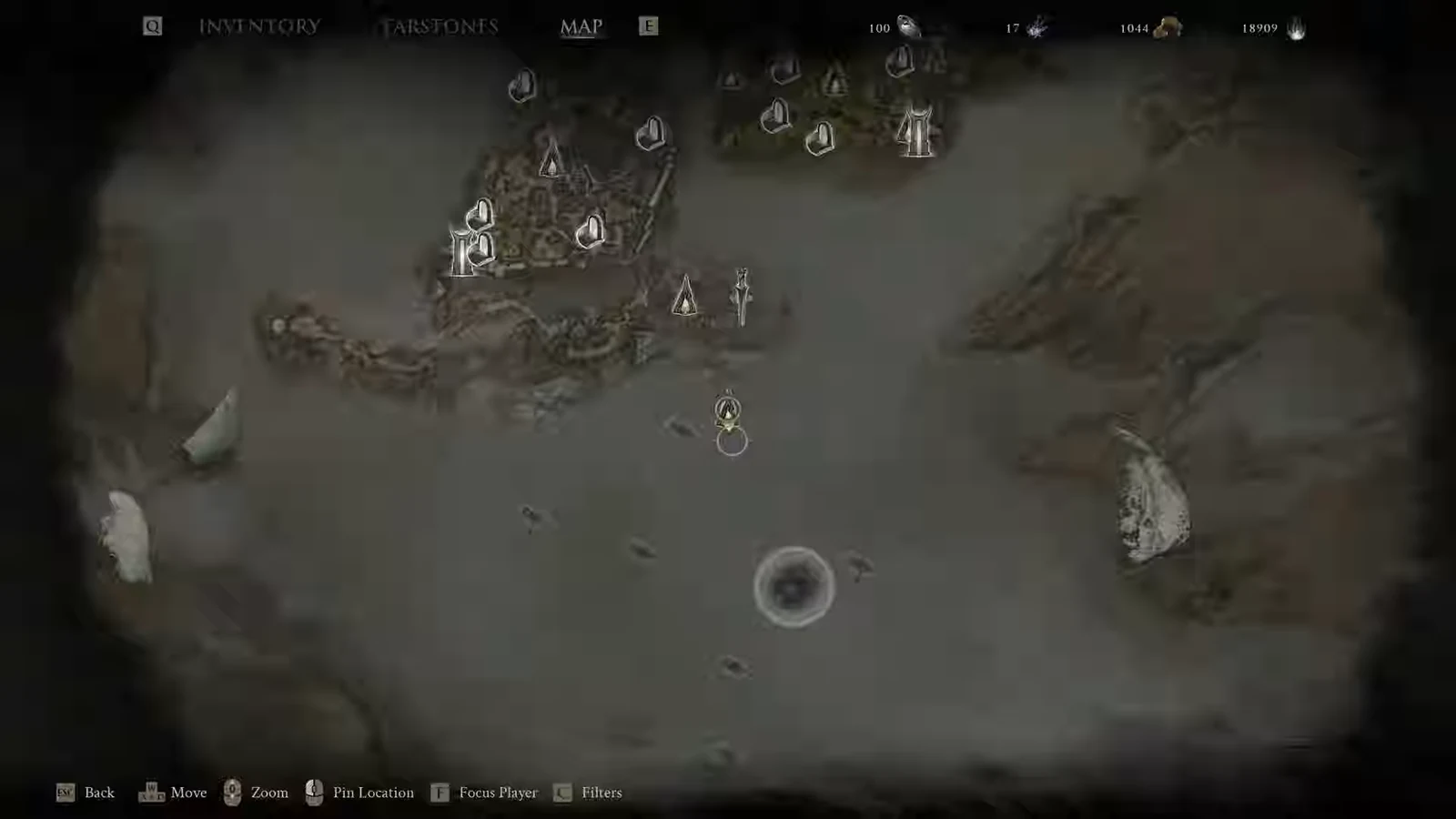 Open world map screen with the player location marker centered in the Outskirts of Mammon
