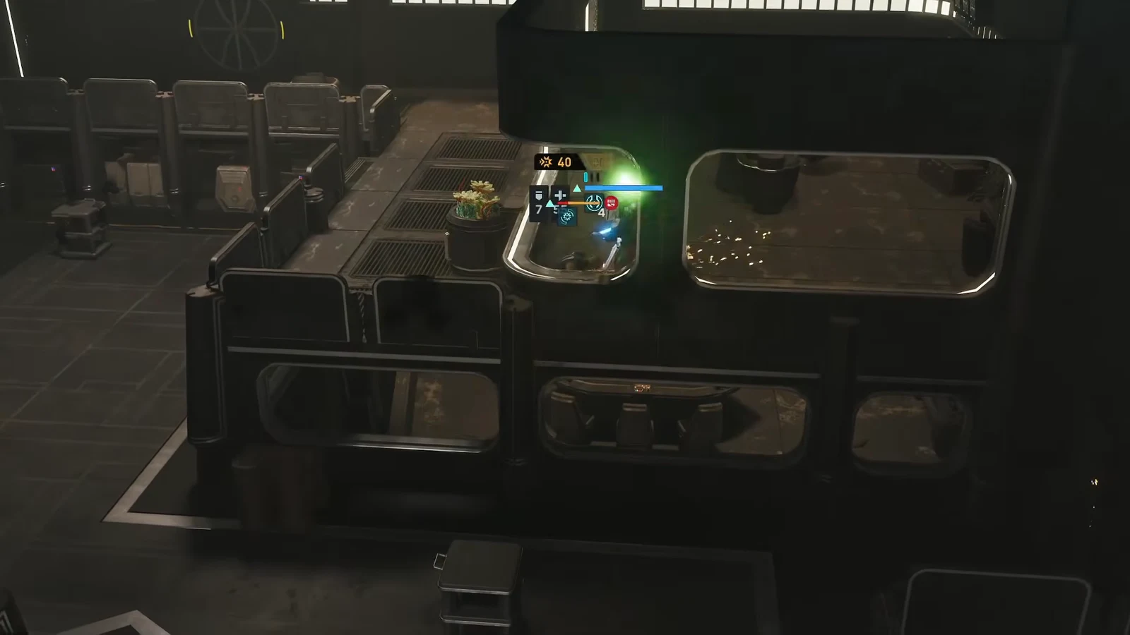 Operator crouched in full cover behind a counter with health and status indicators showing on the HUD