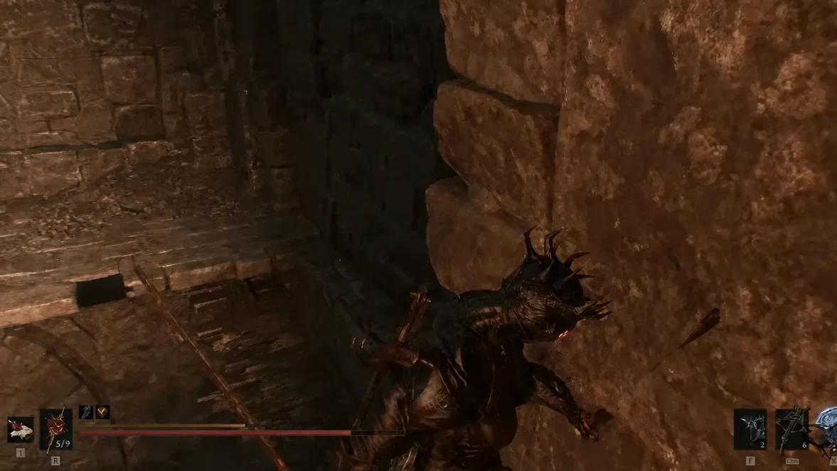 Close-quarters fight beside a stone wall in the lower chamber before opening the chest