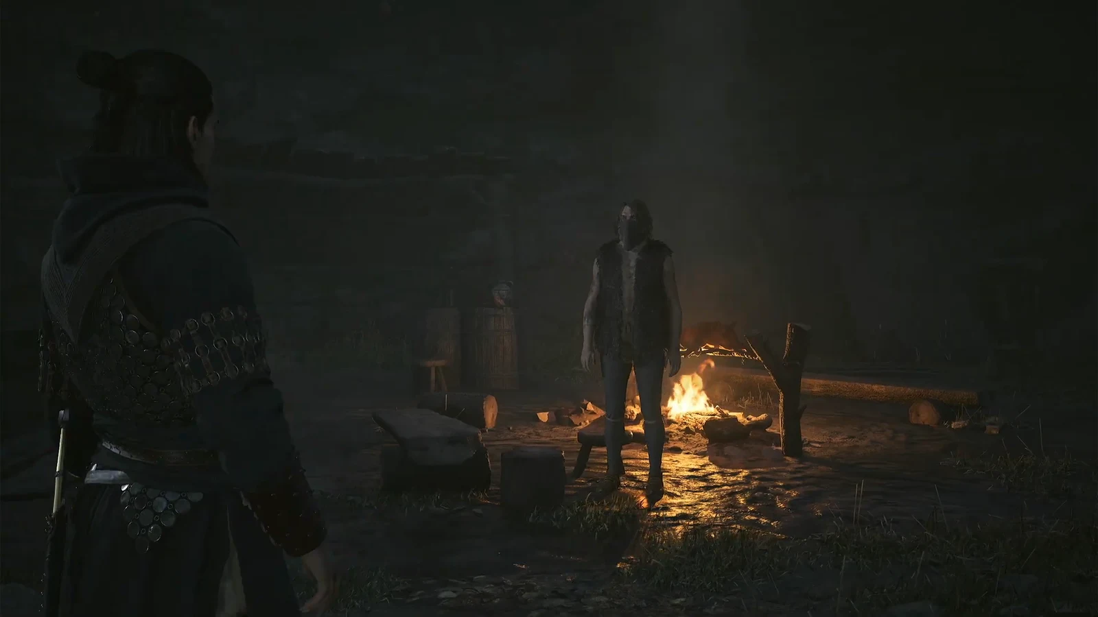 Coen facing a bandit across a campfire before the fight at Boar's Back