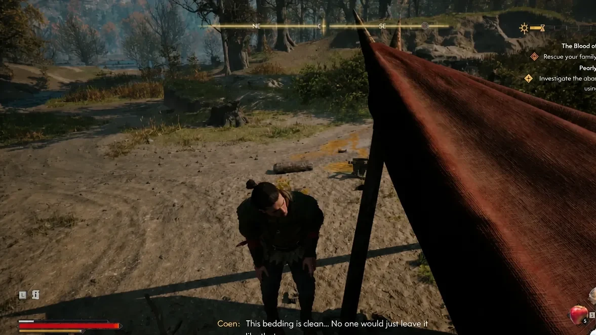 Coen inspecting the clean bedding shelter at the abandoned camp during the investigation objective