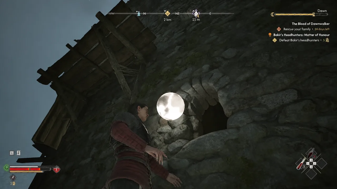 Glowing orb beside a rocky cave entrance during the climb up Silts Tower