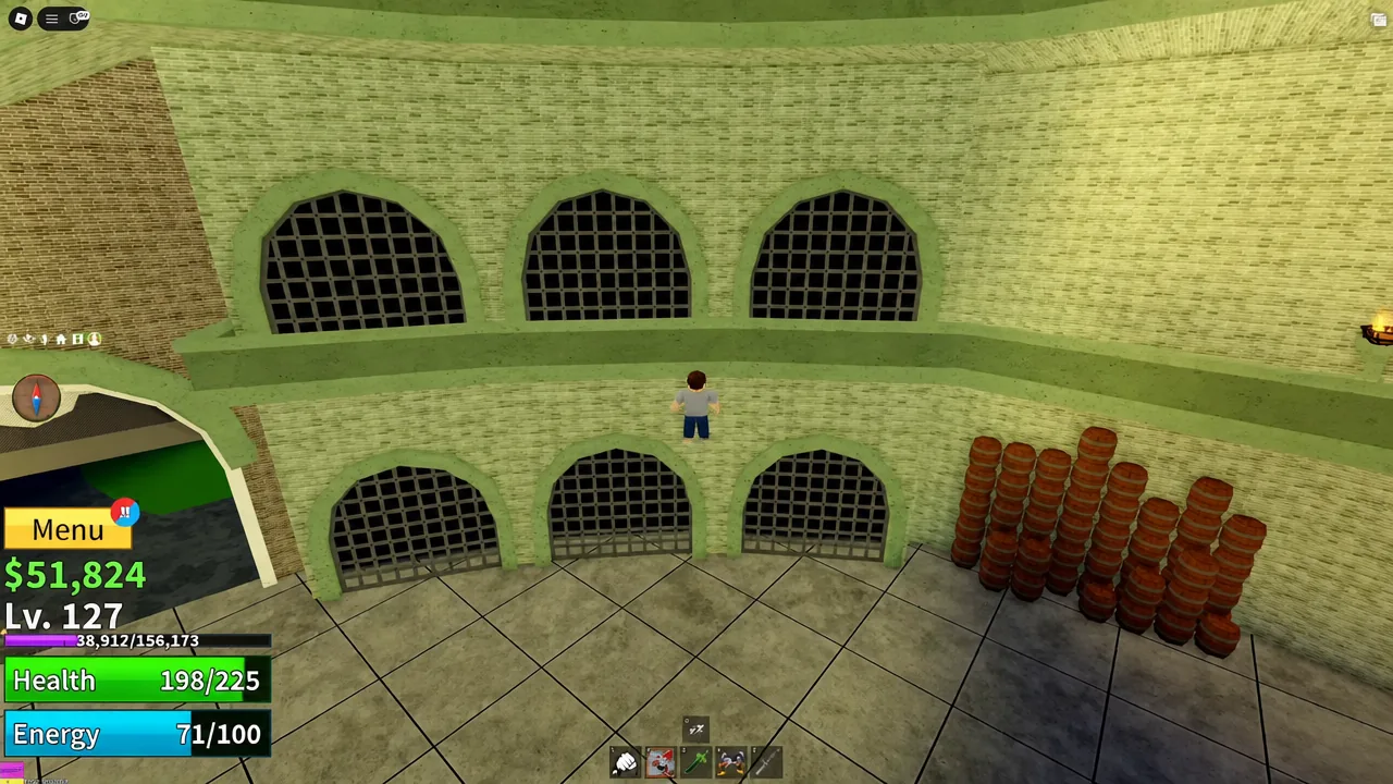Player character standing in the Prison Island fortress courtyard before entering the keep