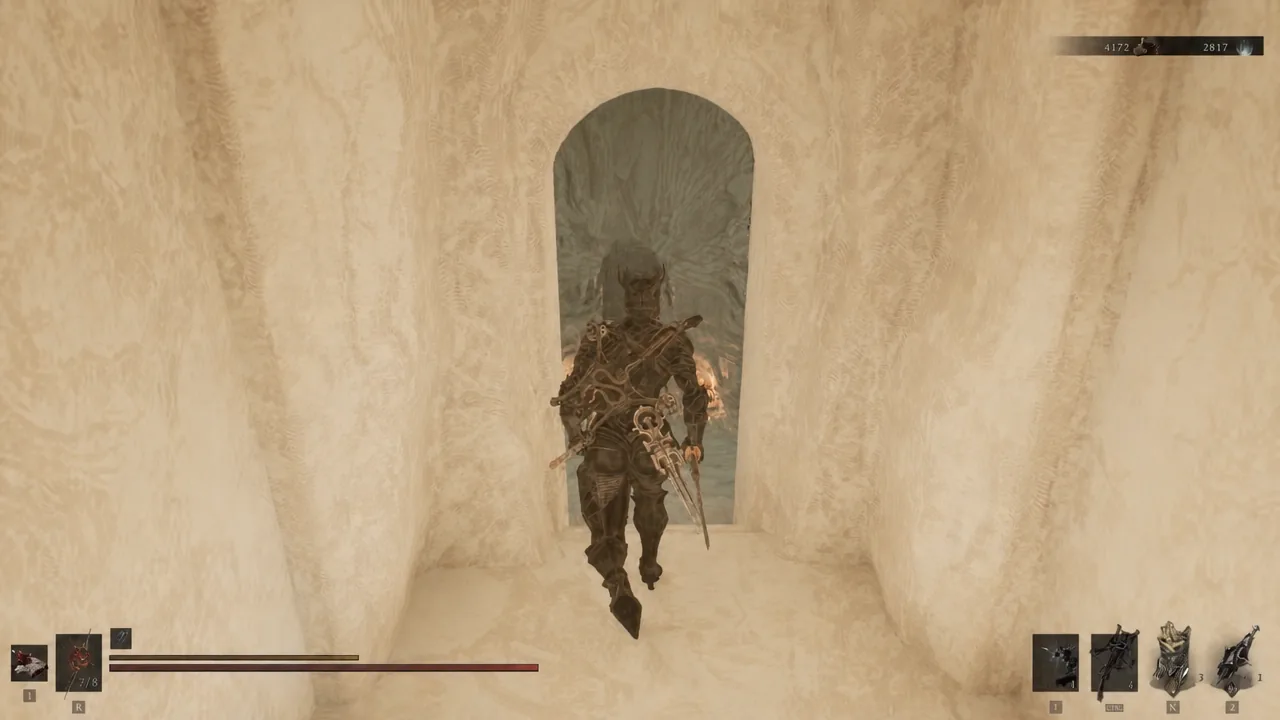 Armored character walking through an arched stone doorway inside the frozen caverns