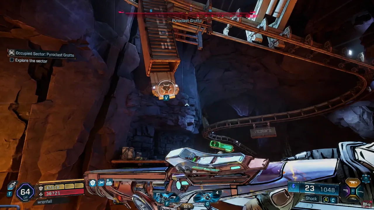Crosshair lined up on a V-marked interactive device inside Pyroclast Grotto