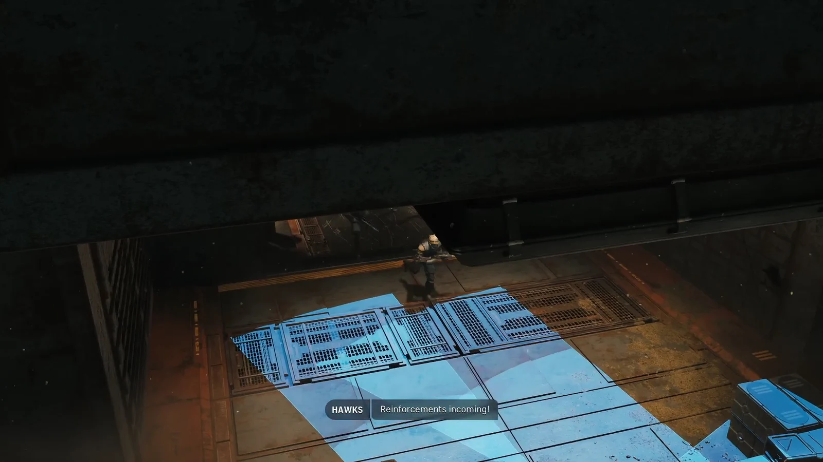 An operator beside a blue holographic floor marker as Hawks warns that reinforcements are incoming