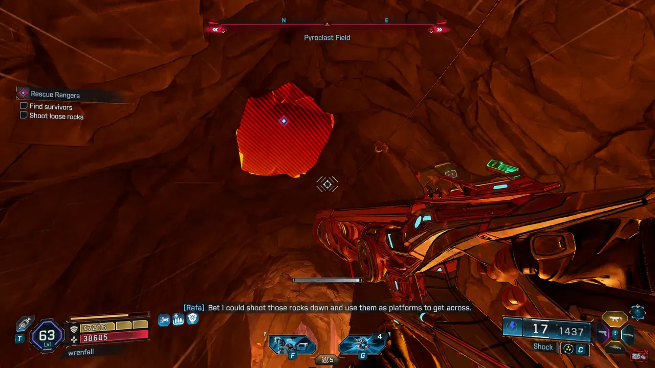 Player aiming at a marked overhead rock above lava with the Shoot loose rocks objective active