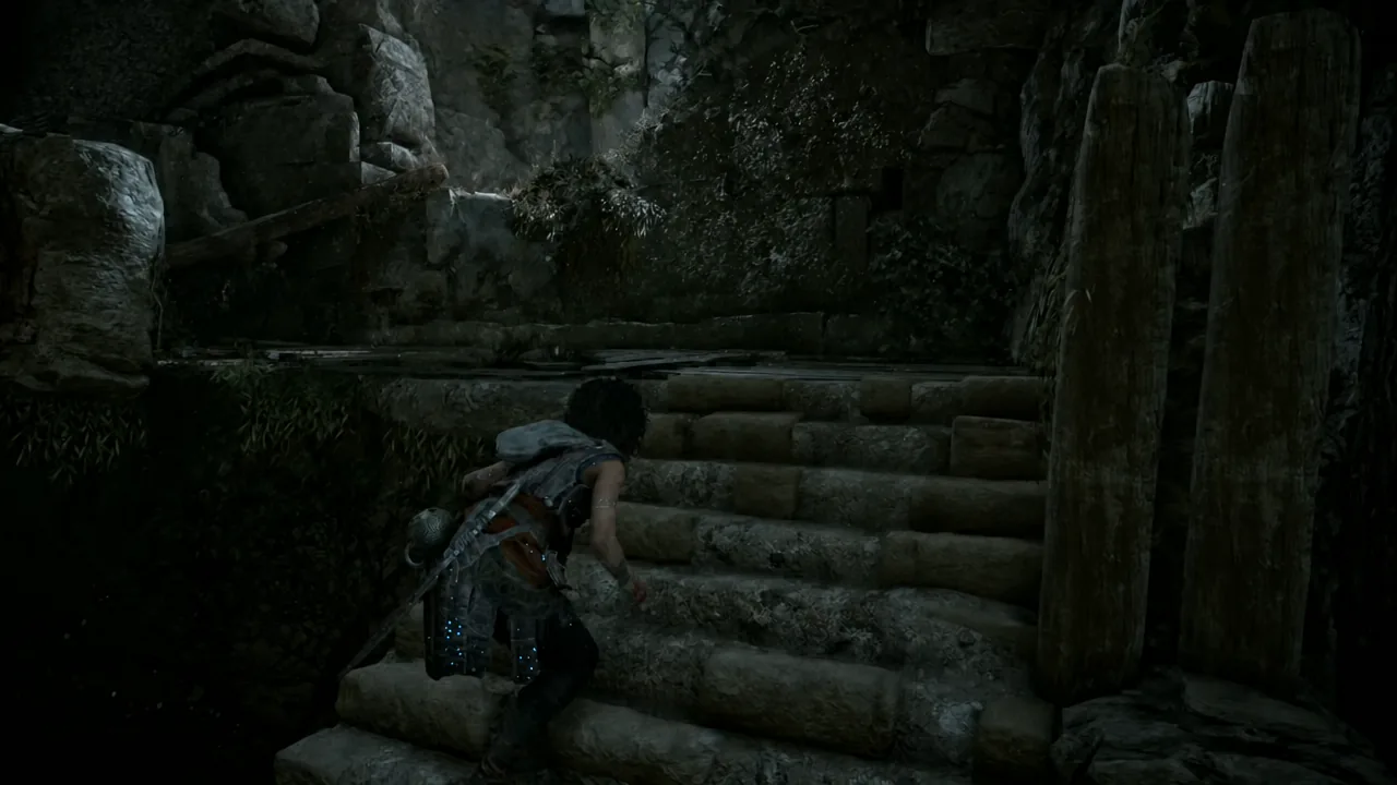 Sophia climbing ancient stone steps through a dark ruin in Chapter IX