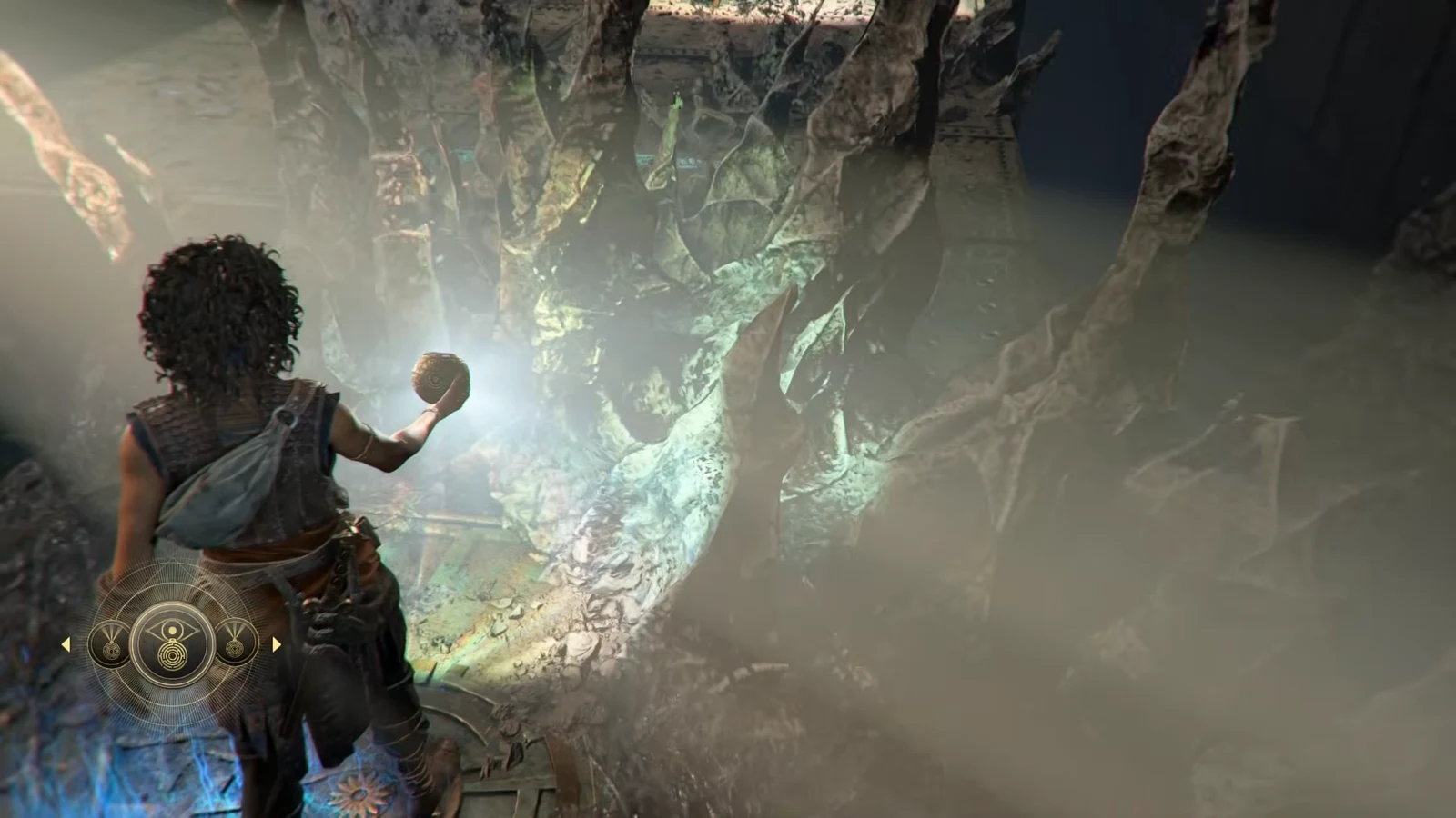 The radial ability wheel is open in the corner as Sophia holds the glowing orb up to a large stone mechanism