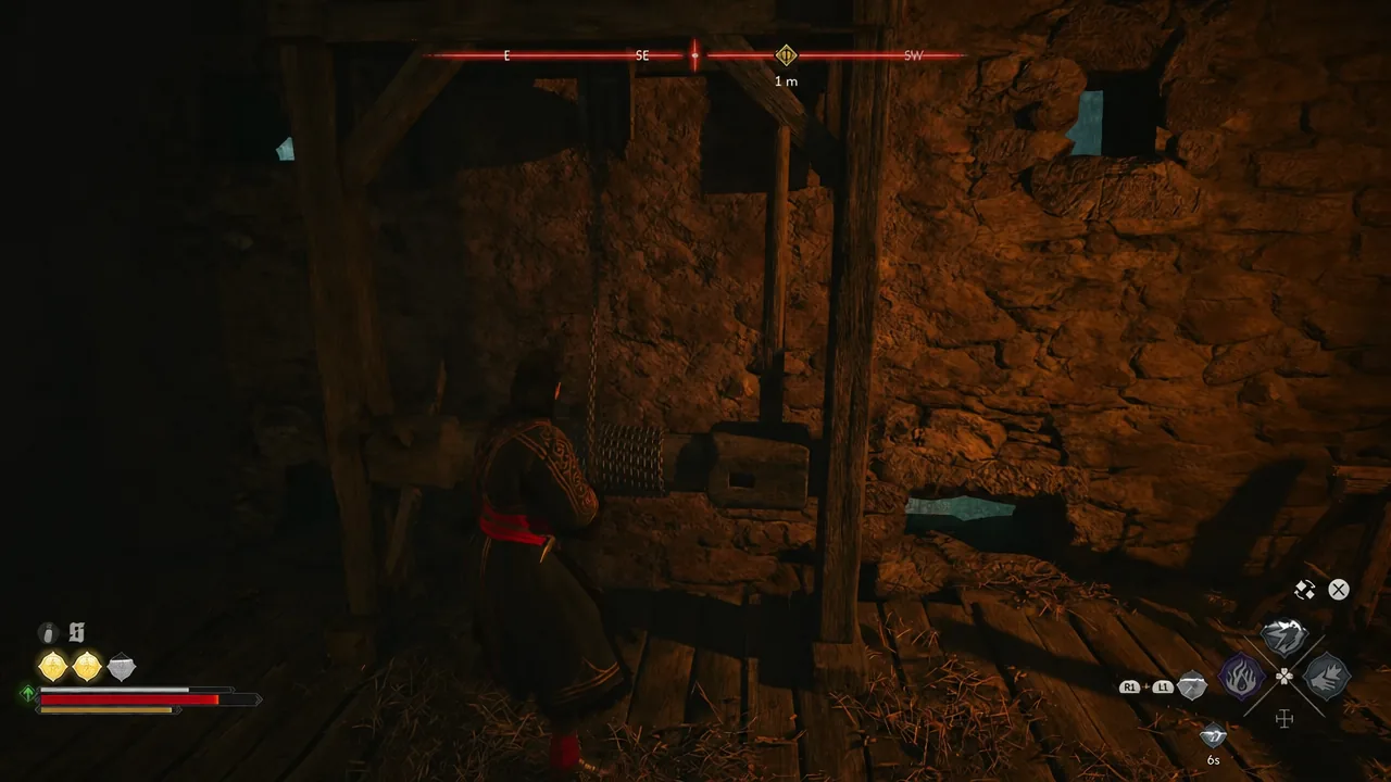 Coen standing in front of the wall-mounted turnstile crank inside the tower