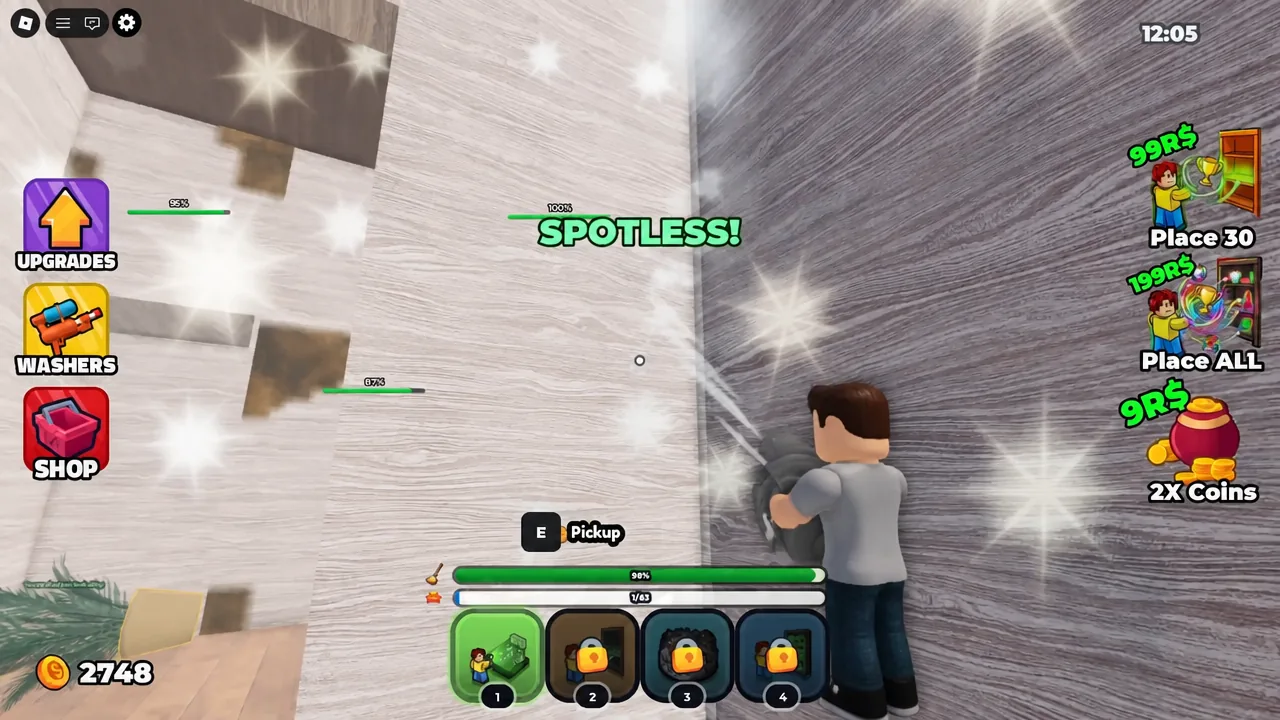Wall being sprayed clean with the Spotless status and cleaning progress visible on screen