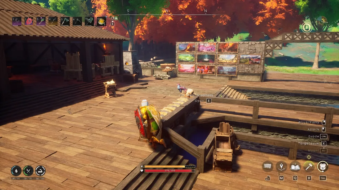 Framed Ashenfall paintings hung on a base wall during the item showcase