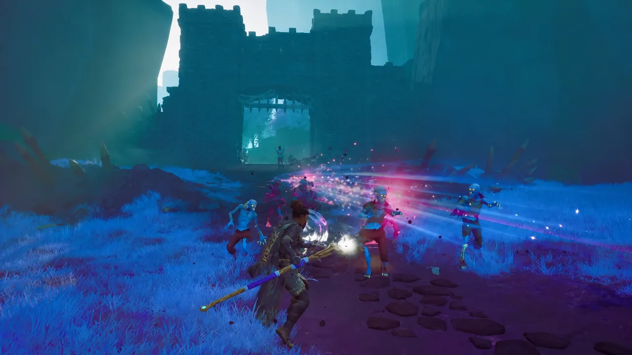 Player fighting a group of enemies with a glowing staff outside a castle gate