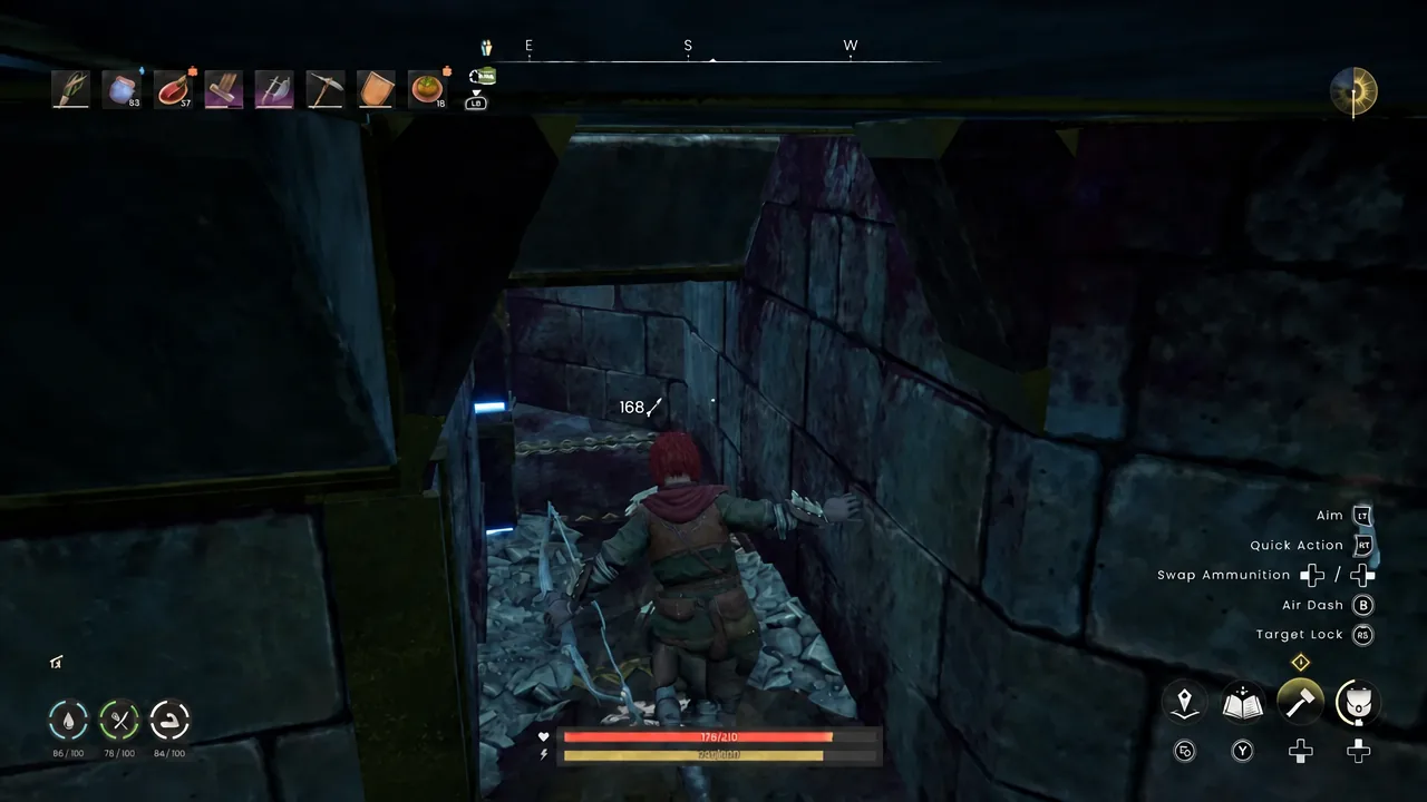 Player moving along a narrow passage filled with fallen stone inside the sealed section of the vault