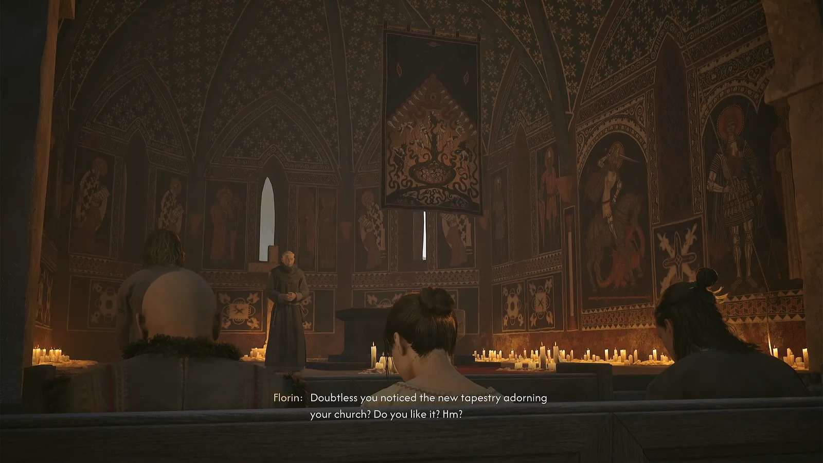 Florin addressing the seated congregation about the new tapestry hanging in the church