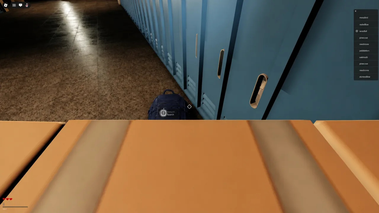 Search prompt lit up on a black backpack next to blue school lockers
