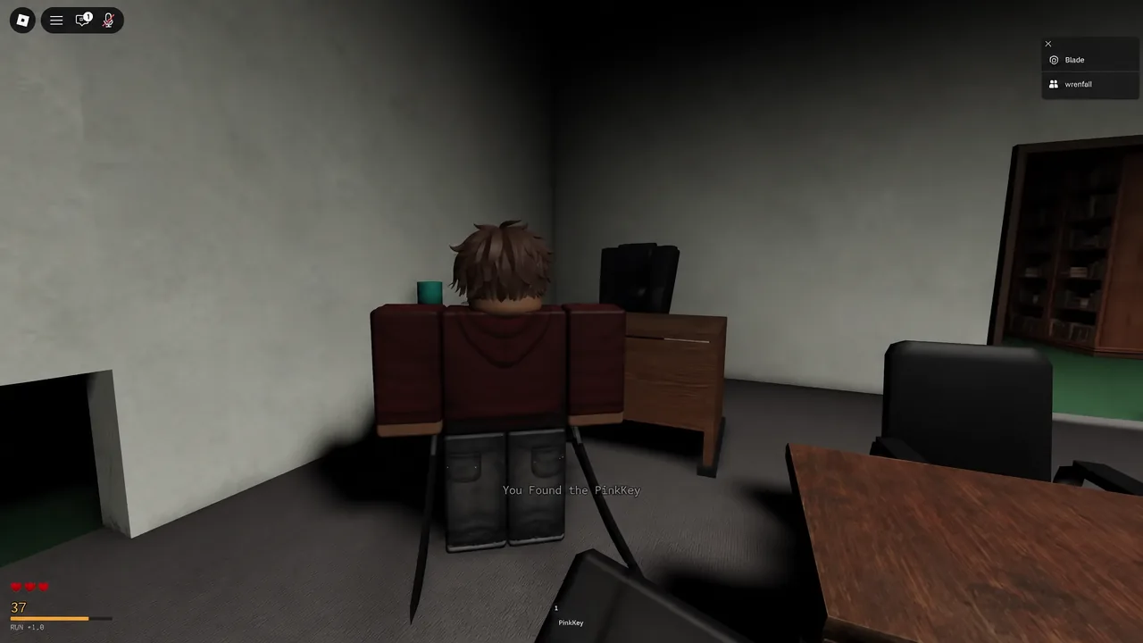 Searching a black backpack triggers a "You Found the PinkKey" confirmation and adds the key to your bar.