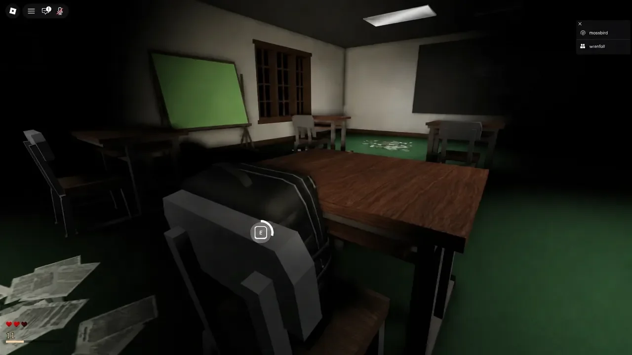 E interaction prompt highlighted on a chair as the player searches a classroom for the last key