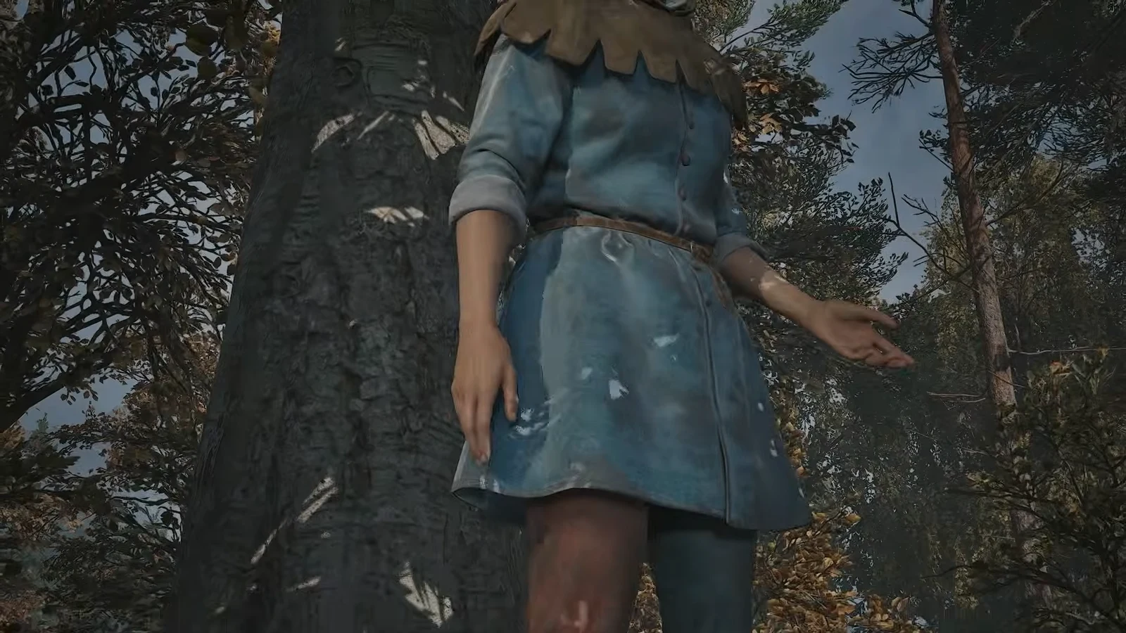 Sara stands free by the tree as Coen explains that Mert sent him to find the manumits.