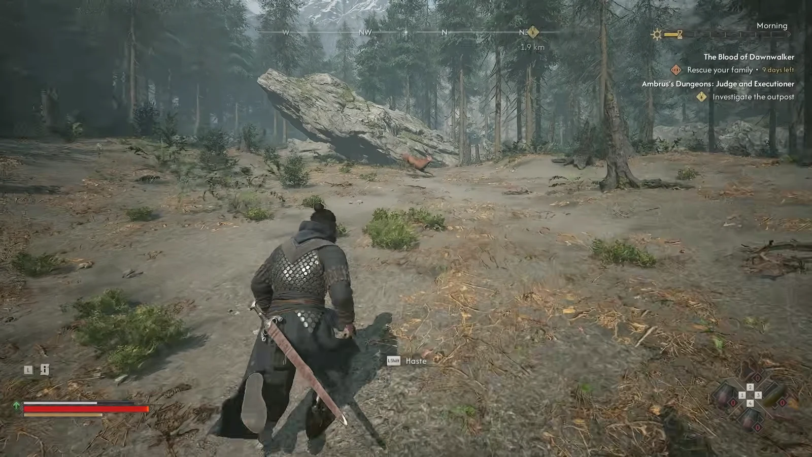Coen running along a wooded dirt trail with the Haste prompt showing on the HUD