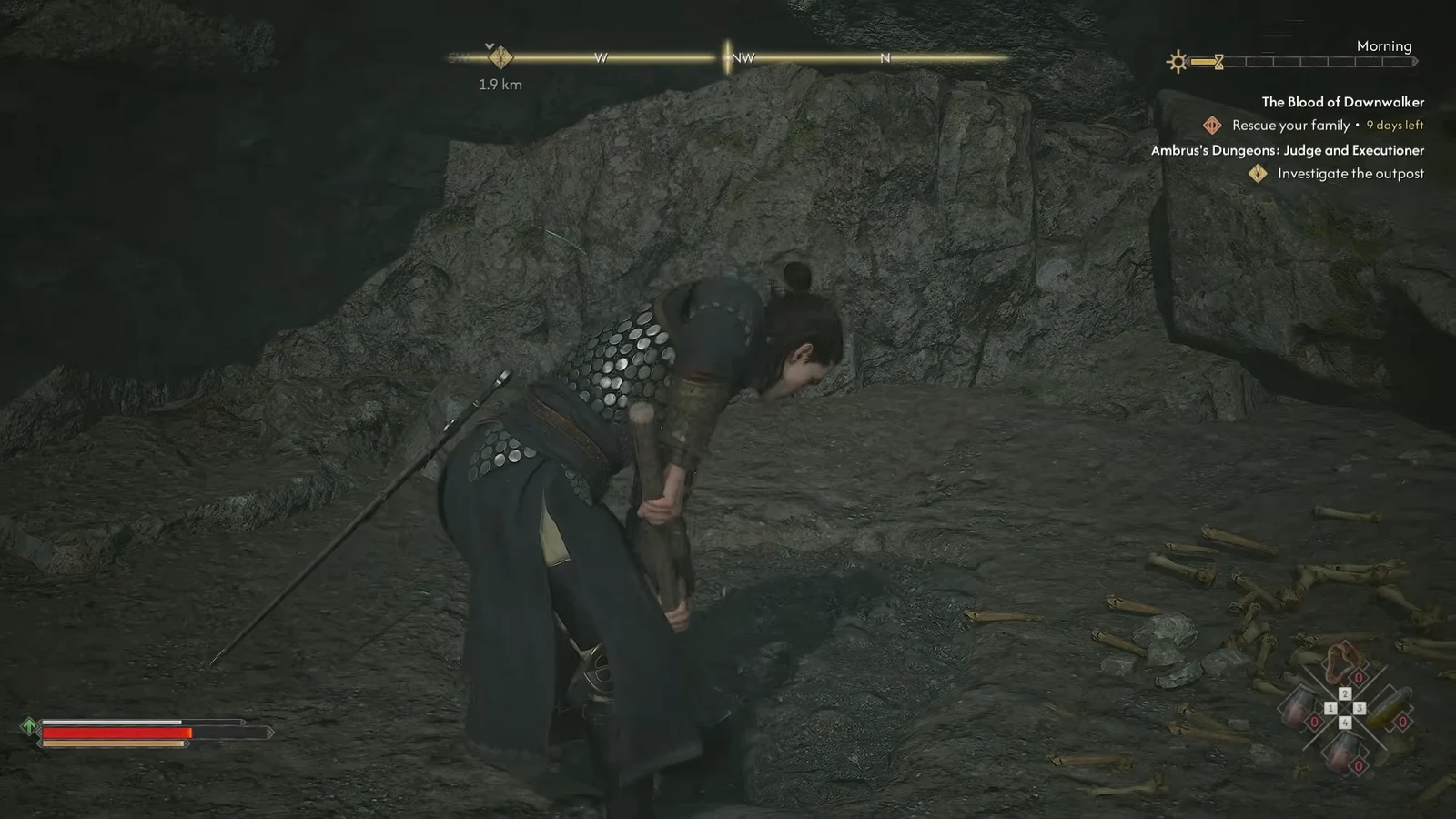 Coen crouched inside the shallow cave beneath the rock where the treasure is buried