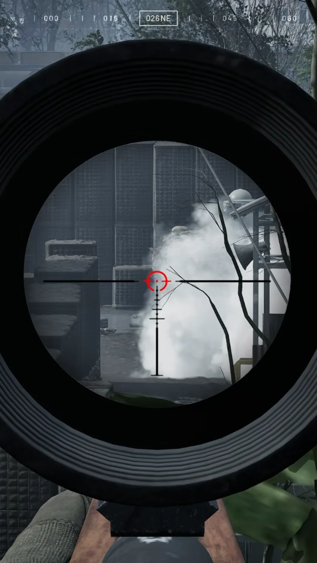 Scope view aimed into a thick smoke screen with the red reticle centered and a 026 NE heading
