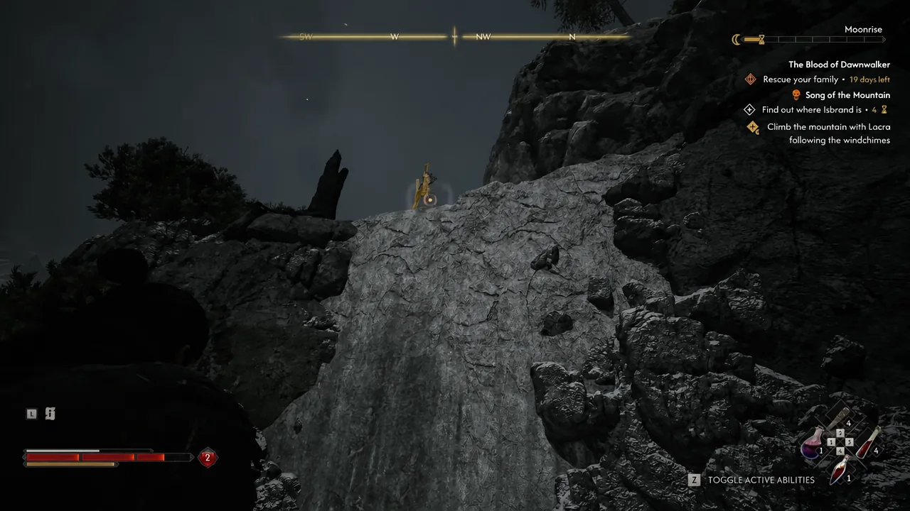 Coen scaling another cliff face high on the mountain at night