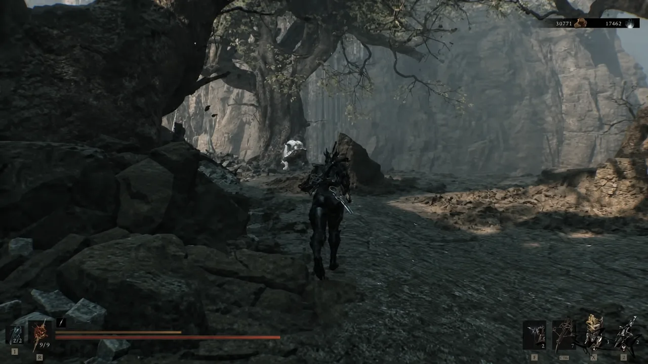 Riding along a rocky path toward a pale creature between beacons in the Ruins of Mammon