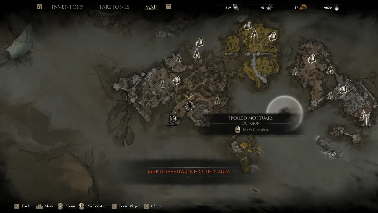 Map screen highlighting the Spoiled Mortuary dungeon with the mark complete prompt visible