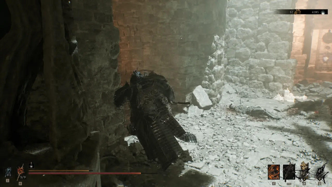 Player moving through a narrow ruined stone corridor inside the mortuary