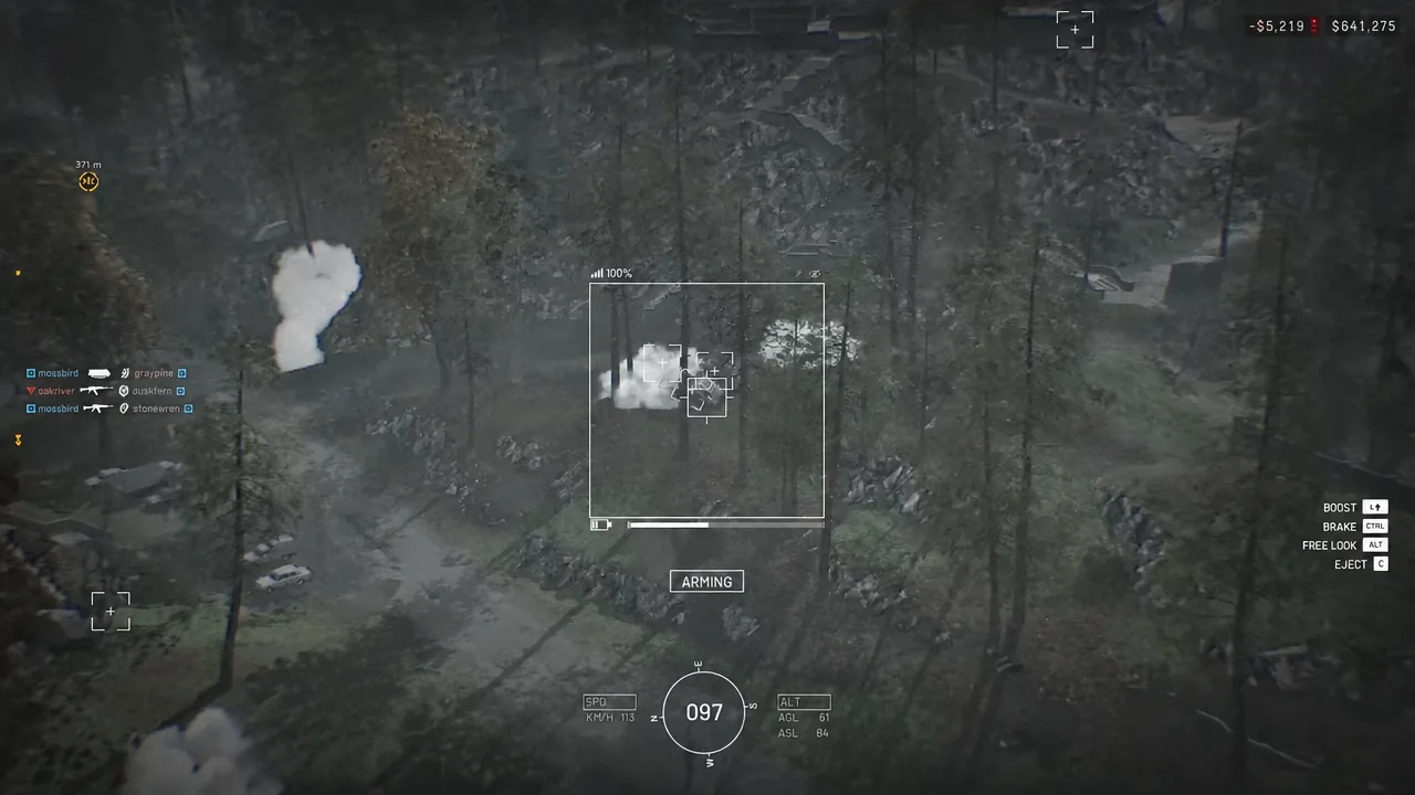 Drone targeting view showing the ARMING indicator while the warhead arms on approach