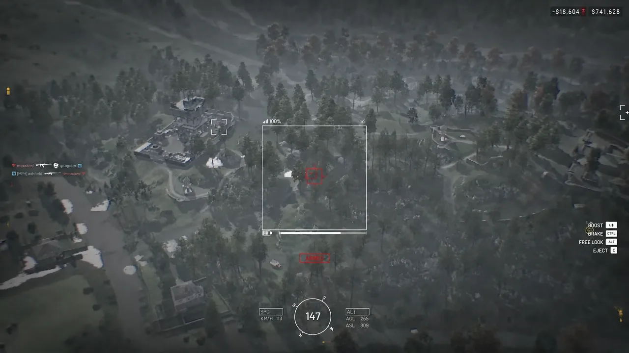 Red targeting reticle centered on a marked ground vehicle during the terminal dive