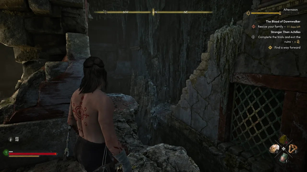The Find a way forward objective on screen as Coen searches the collapsed section of the ruins