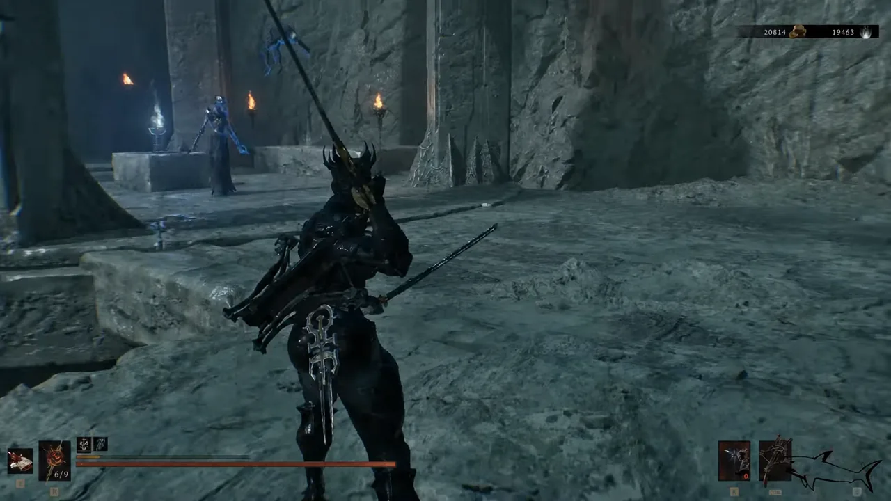 Armored player approaches a blue-robed caster inside the large Ashen Sanctum chamber