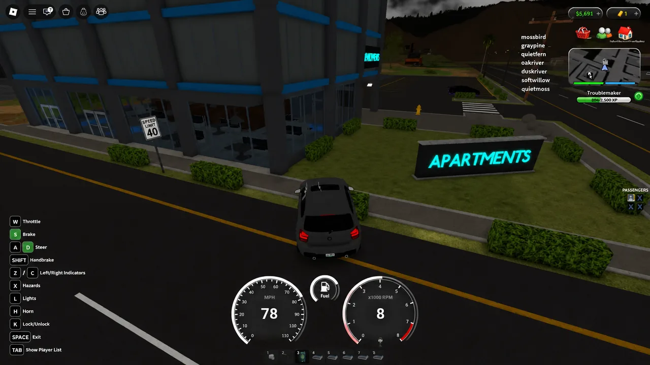Driving view approaching the Apartments building with the speed dashboard on screen