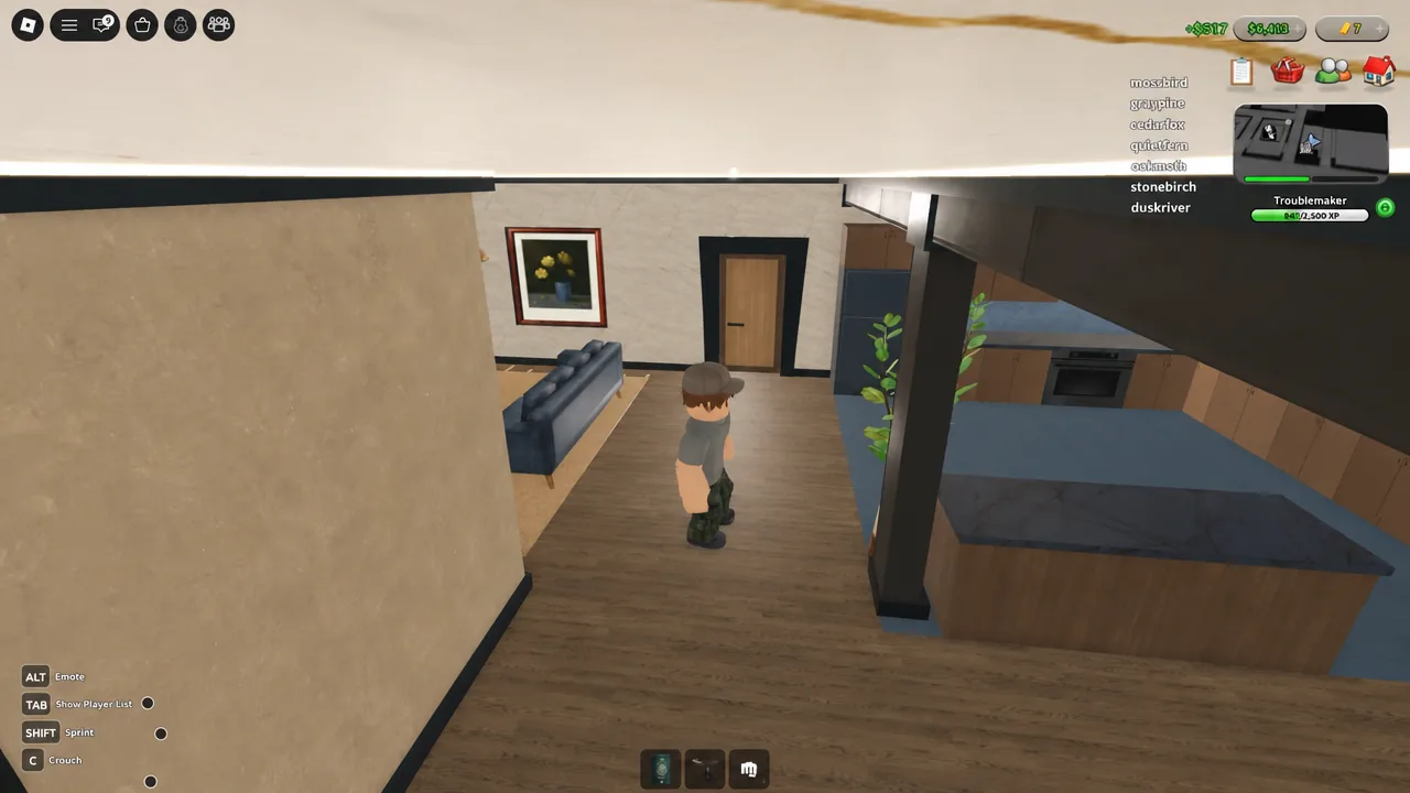 Player character standing inside a furnished rented apartment with the HUD visible