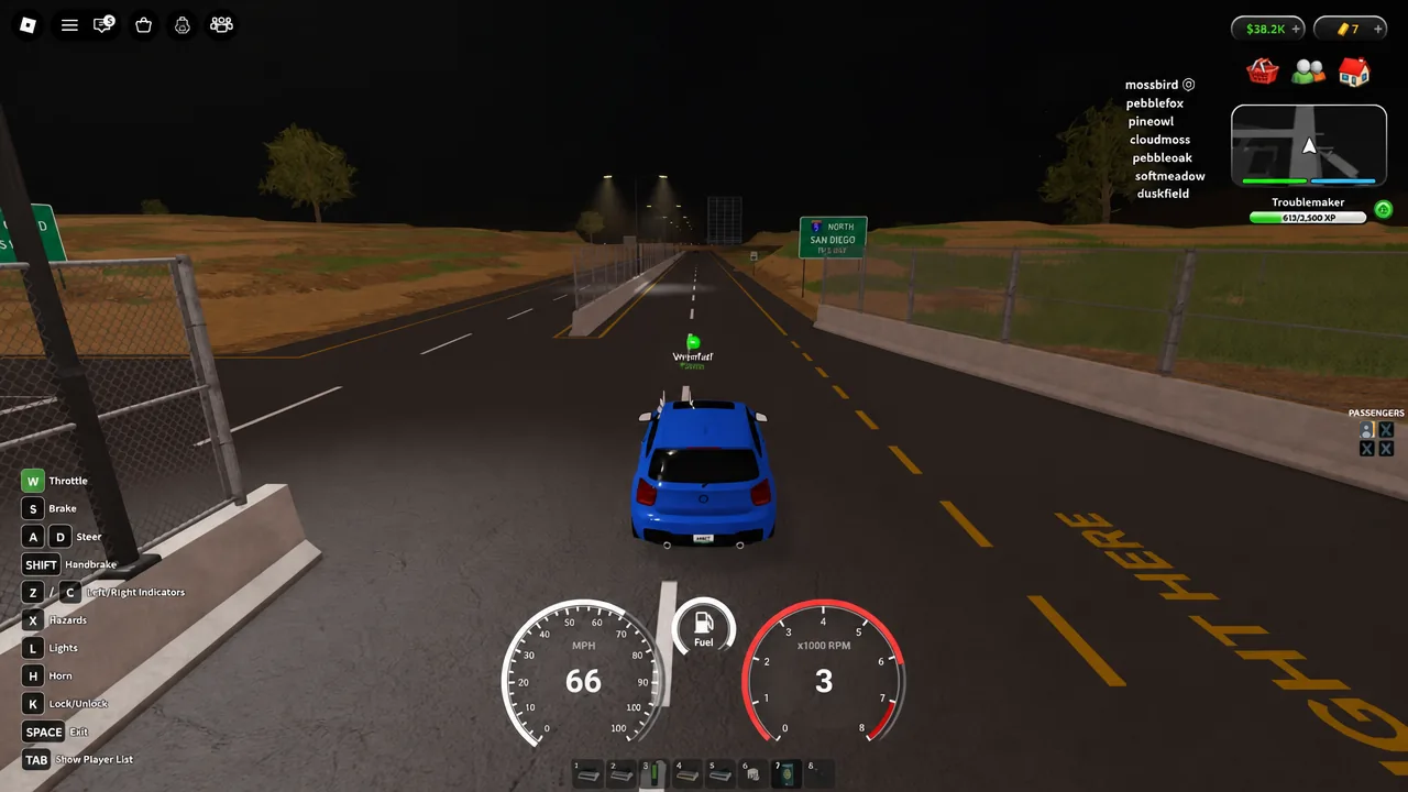 Blue player car driving toward the North San Diego sign with speed and fuel HUD