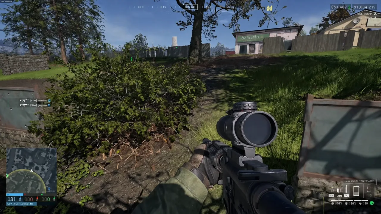 Player advancing along a path toward a fenced building while aiming a scoped rifle