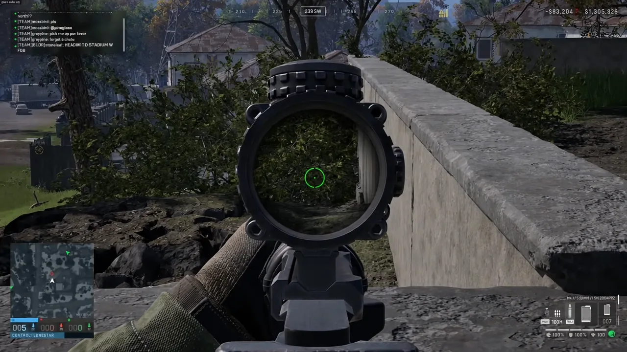 First-person view aiming a scoped rifle at foliage beside a concrete wall