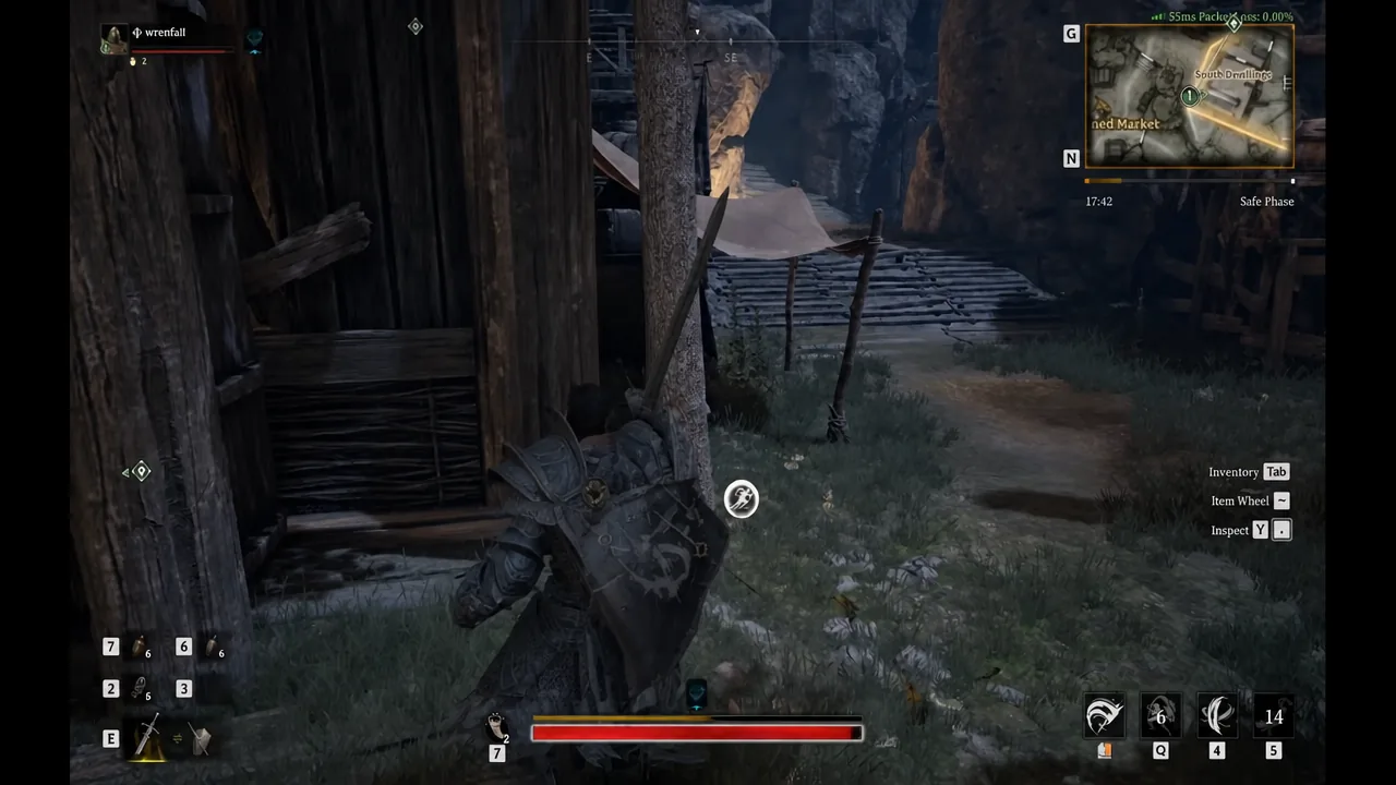 Armored player character standing beside a wooden structure with an interaction prompt active