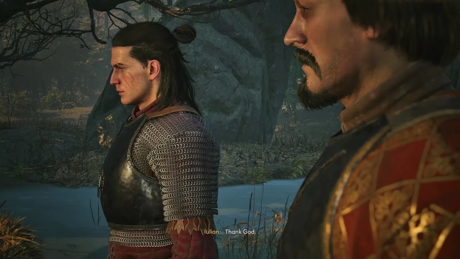 Iulian standing beside a companion at a pond, saying 'Thank God' during a dialogue scene