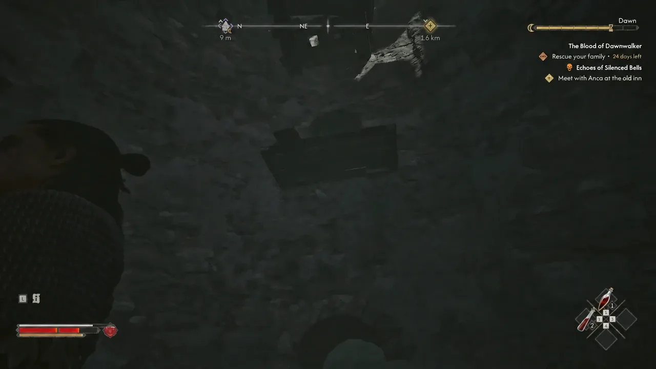 Coen moves through a dark passage with the objective marker tracked in the corner of the screen